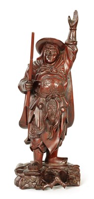 Lot 319 - A 19TH CENTURY CHINESE CARVED HARDWOOD FIGURE