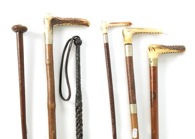 Lot 477 - A COLLECTION OF SIX EARLY 20TH CENTURY AND LATER RIDING WHIPS AND CROPS