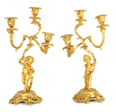 Lot 628 - A PAIR OF 19TH CENTURY ORMOLU FIGURAL THREE BRANCH CANDELABRA