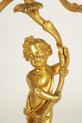 Lot 452 - A PAIR OF 19TH CENTURY ORMOLU FIGURAL THREE BRANCH CANDELABRA