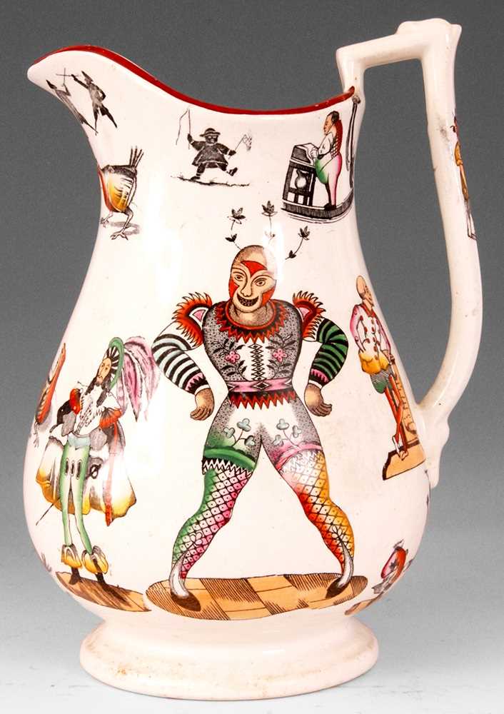 Lot 28 - A MID 19TH CENTURY STAFFORDSHIRE PUZZLE JUG...