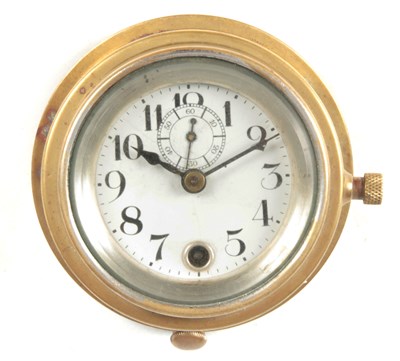 Lot 825 - A 20TH CENTURY BRASS CASED CAR CLOCK