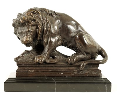 Lot 591 - A 20TH CENTURY BRONZE SCULPTURE OF A LION