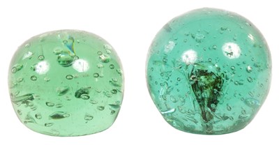 Lot 30 - A PAIR OF LARGE 19TH CENTURY GREEN GLASS DUMP WEIGHTS