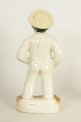 Lot 175 - A 19TH CENTURY STAFFORDSHIRE FIGURE OF A SAILOR