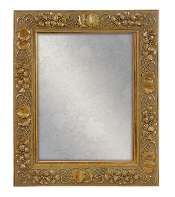 Lot 705 - AN ARTS & CRAFTS BRONZED GESSO FRAMED MIRROR