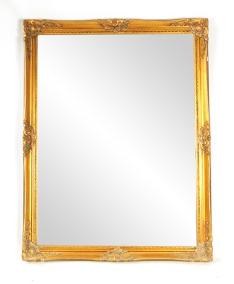 Lot 1018 - A MODERN SWEPT GILT FRAME MIRROR