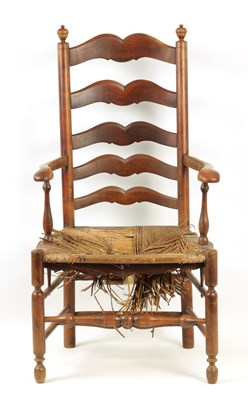 Lot 1101 - A 19TH CENTURY FRUIT WOOD LADDER BACK ARMCHAIR