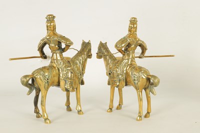 Lot 257 - A PAIR OF EARLY CHINESE BRASS SCULPTURES