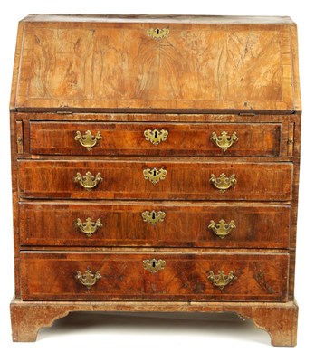 Lot 991 - AN EARLY 18TH CENTURY HERRING-BANDED FIGURED WALNUT BUREAU