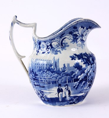 Lot 26 - AN EARLY 19TH CENTURY BLUE AND WHITE WATER JUG...