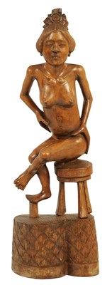 Lot 938 - AN EARLY 20TH CENTURY BALINESE HARDWOOD CARVED NUDE LADY FIGURE