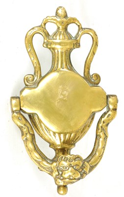 Lot 538 - A 19TH CENTURY BRASS DOOR KNOCKER