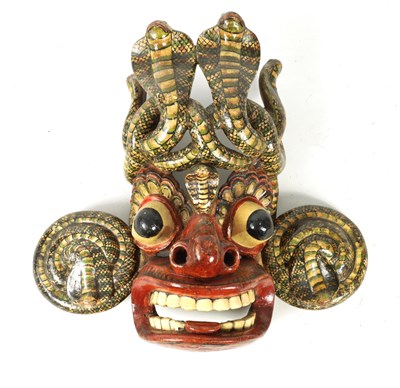 Lot 251 - AN EARLY 18TH CENTURY SRI LANKAN SEVEN SNAKES CARVED WOODEN MASK