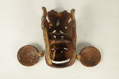Lot 251 - AN EARLY 18TH CENTURY SRI LANKAN SEVEN SNAKES CARVED WOODEN MASK
