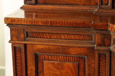 Lot 969 - A GEORGE III SHERATON STYLE FIDDLE-BACK MAHOGANY BREAKFRONT BOOKCASE OF SMALL SIZE AND PROPORTIONS