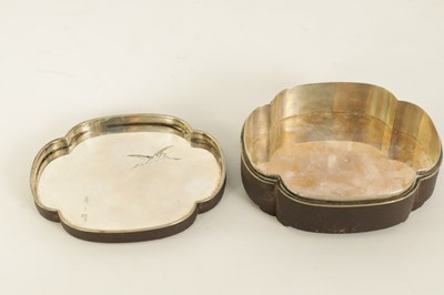 Lot 212 - A JAPANESE MEIJI PERIOD SILVER INLAID AND LINED SHAPED OVAL IRONWORK BOX
