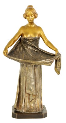 Lot 599 - MAURICE BOUVAL (1863-1916)  AN ART NOUVEAU GILT AND SILVERED BRONZE FIGURE