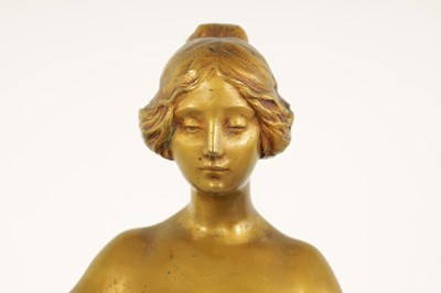 Lot 599 - MAURICE BOUVAL (1863-1916)  AN ART NOUVEAU GILT AND SILVERED BRONZE FIGURE