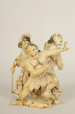 Lot 172 - A JAPANESE MEIJI PERIOD CARVED IVORY SCULPTURE