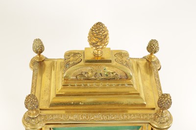 Lot 774 - A LATE 19TH CENTURY FRENCH GILT BRASS FOUR-GLASS MANTEL CLOCK