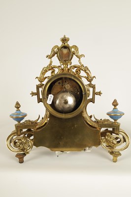 Lot 779 - HOWELL & JAMES, PARIS.  A LATE 19TH CENTURY FRENCH BRASS AND PORCELAIN  PANELLED MANTEL CLOCK