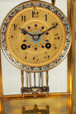 Lot 732 - A LATE 19TH CENTURY FRENCH CHAMPLEVE ENAMEL, BRASS AND ONYX CLOCK GARNITURE