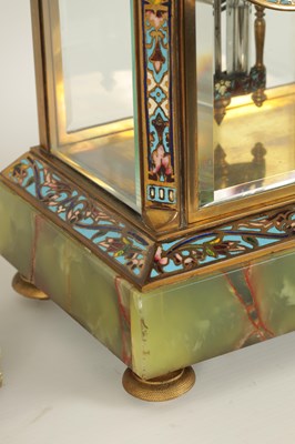 Lot 732 - A LATE 19TH CENTURY FRENCH CHAMPLEVE ENAMEL, BRASS AND ONYX CLOCK GARNITURE