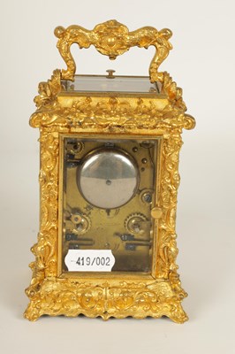 Lot 712 - A FINE MID 19TH CENTURY GILT BRASS FRENCH ROCOCO REPEATING CARRIAGE CLOCK WITH ALARM OF SMALL SIZE - THE CASE WITH MAKERS STAMP TO THE BASE PLATE  S.WEHL. ST. PETERSBURG