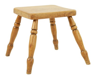 Lot 818 - A 19TH CENTURY SYCAMORE FOUR LEGGED MILKING STOOL