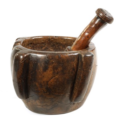 Lot 454 - AN EARLY 16TH/17TH CENTURY BURR WALNUT PESTLE AND MORTAR