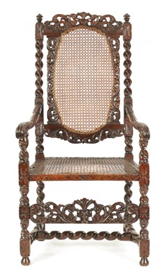 Lot 953 - A CHARLES II CARVED WALNUT BERGERE ARMCHAIR