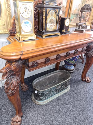 Lot 973 - AN UNUSUAL MID 19TH CENTURY WALNUT SERVING TABLE IN THE MANNER OF WILLIAMS AND GIBTON, DUBLIN