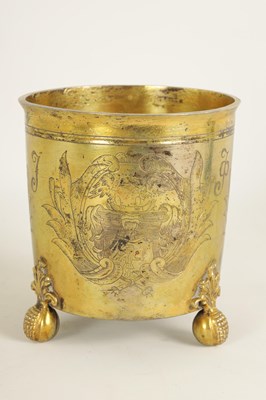 Lot 325 - A LATE 17TH CENTURY GERMAN SILVER GILT CYLINDRICAL BEAKER BEARING ENGRAVED FAMILY CRESTS AND INITIALS