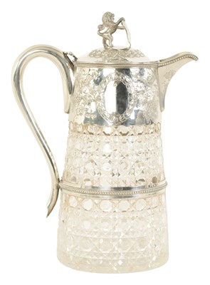 Lot 305 - A VICTORIAN SILVER MOUNTED CLARET JUG