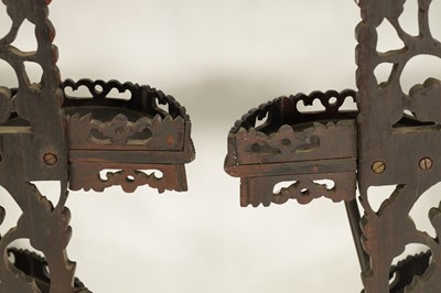 Lot 164 - A PAIR OF 19TH CENTURY CHINESE CARVED HARDWOOD HANGING SHELVES