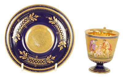Lot 24 - A FINE LATE 19TH CENTURY VIENNA STYLE RICHLY GILT AND ROYAL BLUE CABINET CUP AND SAUCER