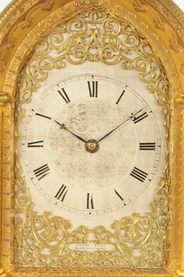 Lot 714 - ATTRIBUTED TO THOMAS COLE.  A FINE GILT BRASS GOTHIC REVIVAL TWIN FUSEE GILT BRASS STRUT CLOCK OF LARGE PROPORTIONS CIRCA 1860