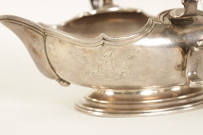 Lot 329 - AN IMPORTANT AND RARE PAIR OF GEORGE I CAST SILVER DOUBLE LIPPED SAUCE BOATS BY PIERRE PLATEL DATED 1717