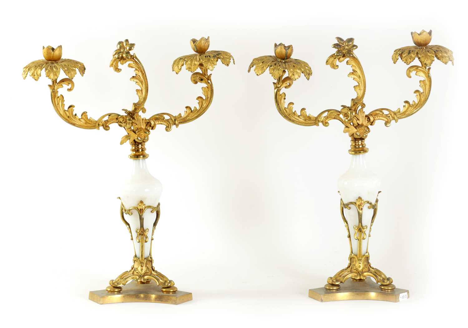 Lot 716 - A PAIR OF 19TH CENTURY TWO BRANCH ORMOLU AND OPAQUE GLASS CANDELABRA