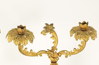 Lot 716 - A PAIR OF 19TH CENTURY TWO BRANCH ORMOLU AND OPAQUE GLASS CANDELABRA