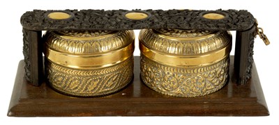 Lot 995 - A 19TH CENTURY CHINESE CARVED HARDWOOD AND BRASS TEA CADDY