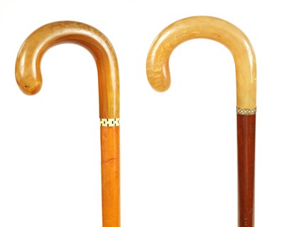 Lot 364 - TWO 19TH CENTURY RHINOCEROS HORN HANDLED WALKING STICKS