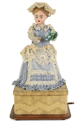 Lot 580 - A LATE 19TH CENTURY FRENCH MUSICAL AUTOMATON DOLL