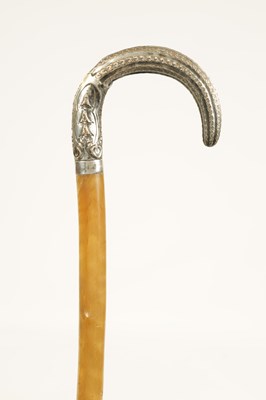 Lot 373 - A LATE 19TH CENTURY RHINOCEROS HORN SILVERED METAL MOUNTED WALKING STICK