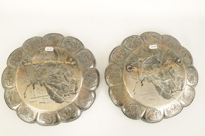 Lot 153 - A PAIR OF 19TH CENTURY SILVERED METAL CHINESE CIRCULAR HANGING PLAQUES