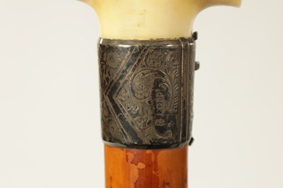 Lot 366 - A 19TH CENTURY EROTIC CARVED IVORY HANDLED WALKING STICK