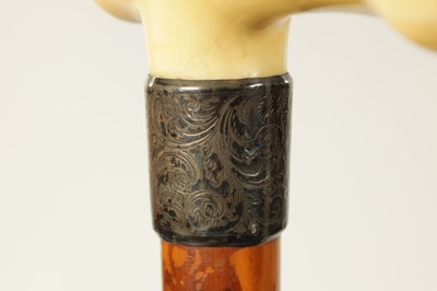 Lot 366 - A 19TH CENTURY EROTIC CARVED IVORY HANDLED WALKING STICK