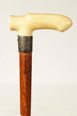 Lot 366 - A 19TH CENTURY EROTIC CARVED IVORY HANDLED WALKING STICK