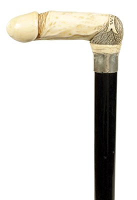 Lot 369 - A 19TH CENTURY CARVED IVORY AND EBONISED WALKING STICK